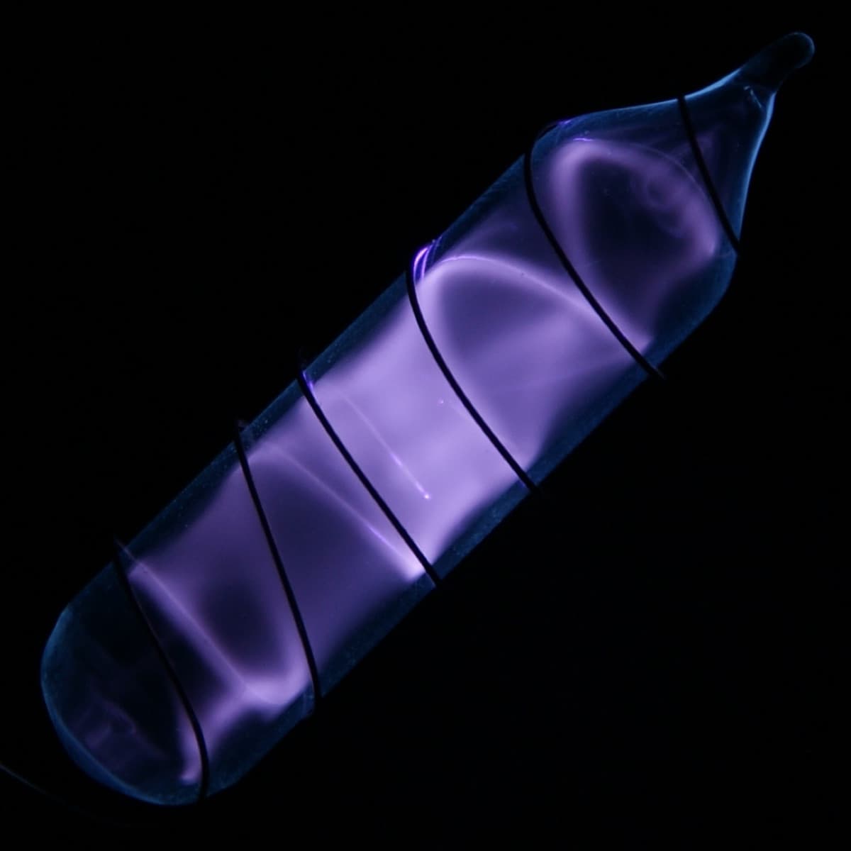 Vial of glowing ultrapure hydrogen, H2. Original size in cm: 1 x 5