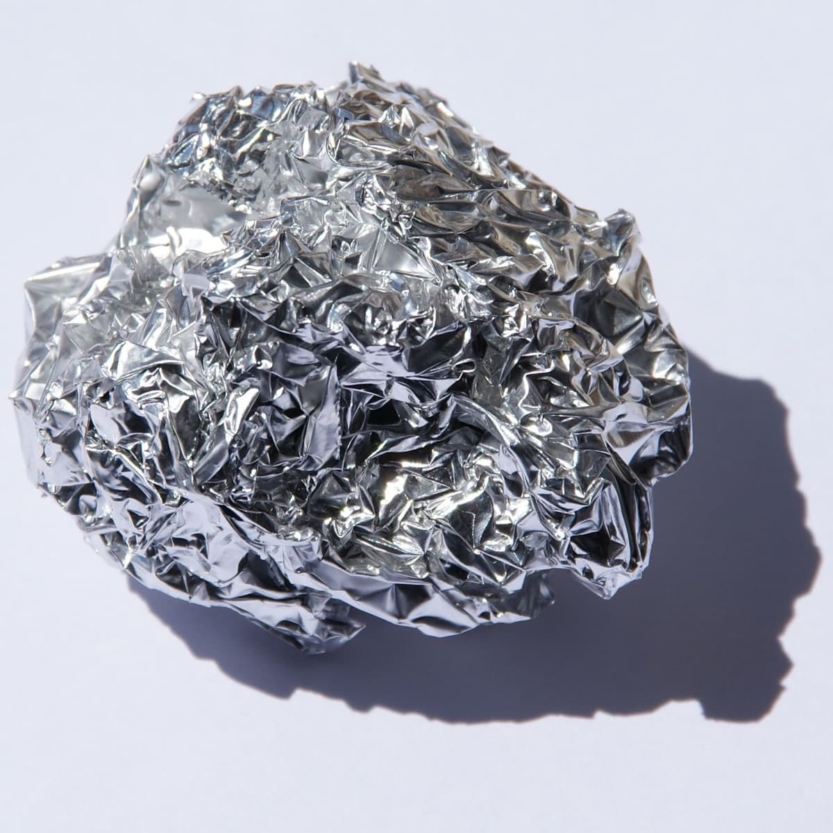 Pure aluminium foil. Original size in cm: 5 x 5
