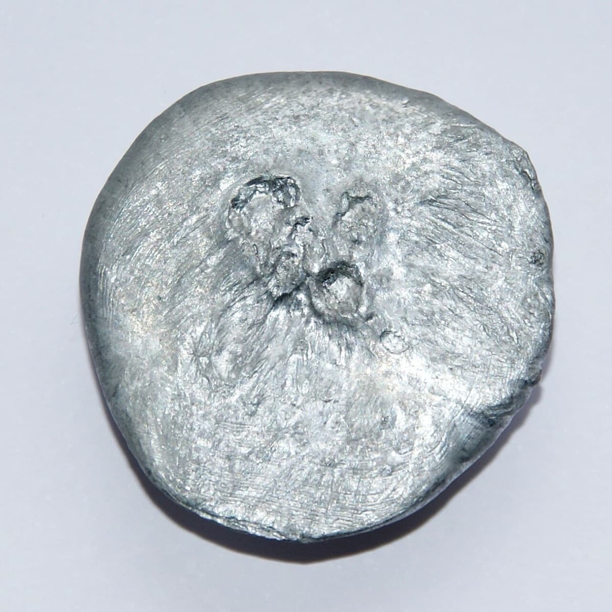 30 grams Zinc, front and back side. Original size in cm: 3