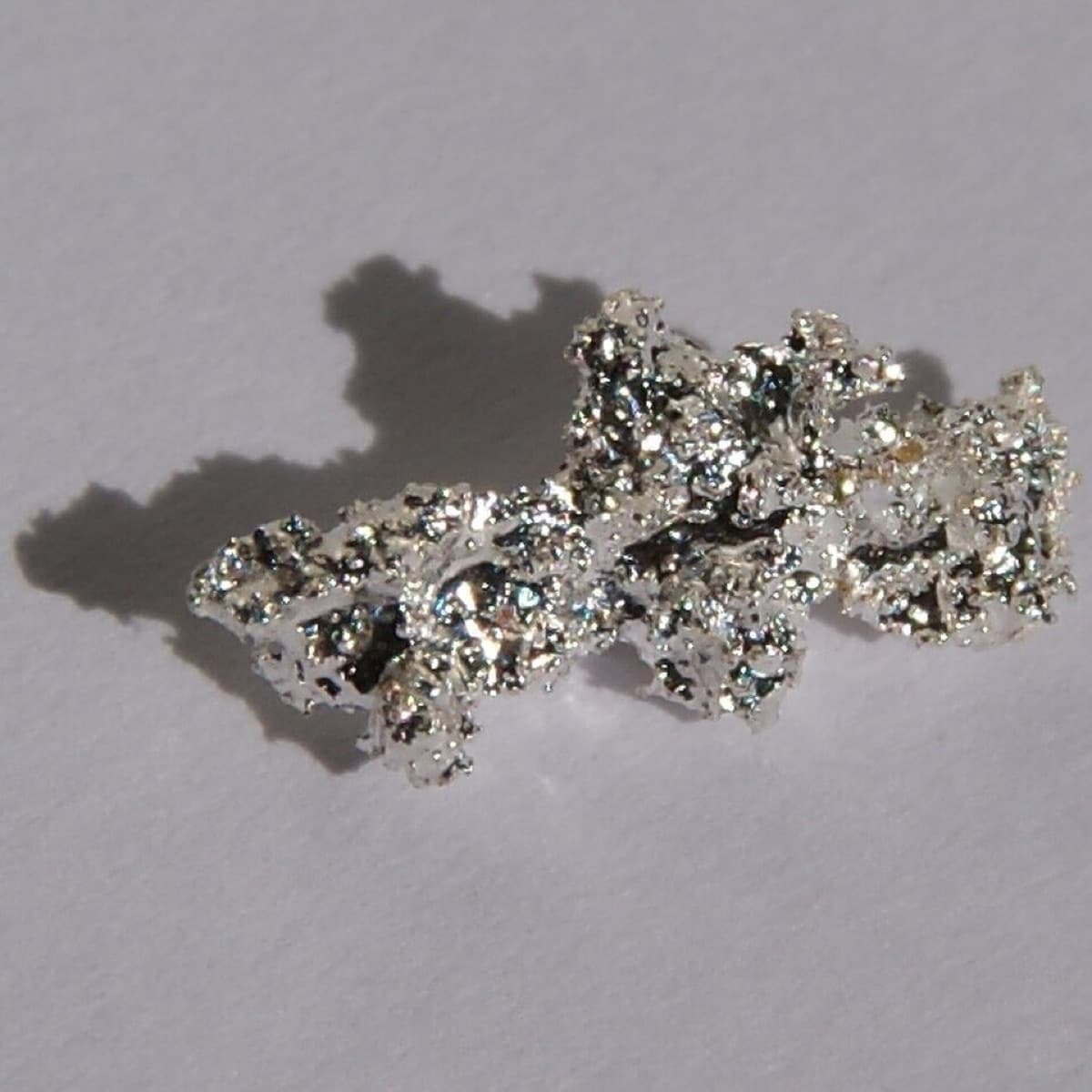 Natural silver nugget, 1 cm long.