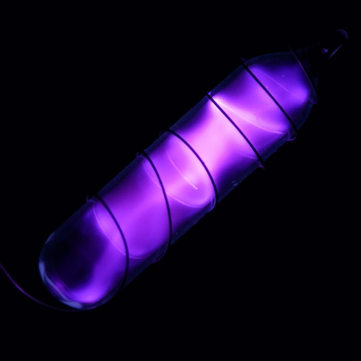 Vial of Glowing Ultrapure Nitrogen, N2. Original size in cm: 1 x 5