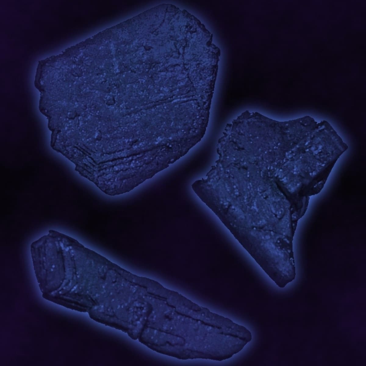 This is only an illustration, not astatine itself. Crystals similar to iodine, but darker in color than these, which due to the extreme radioactivity glow blue and evaporate to dark purple gas